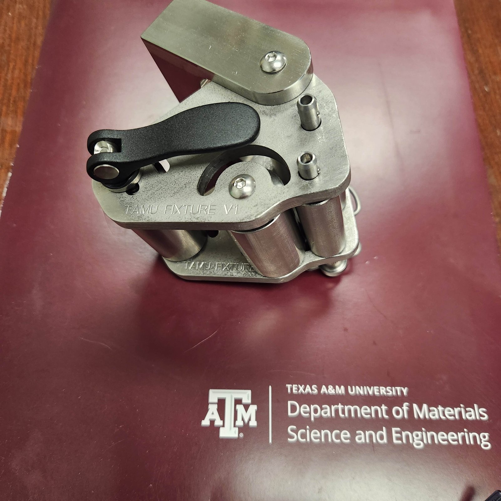 Redesigned TAMU floating roller peel (FRP) test fixture